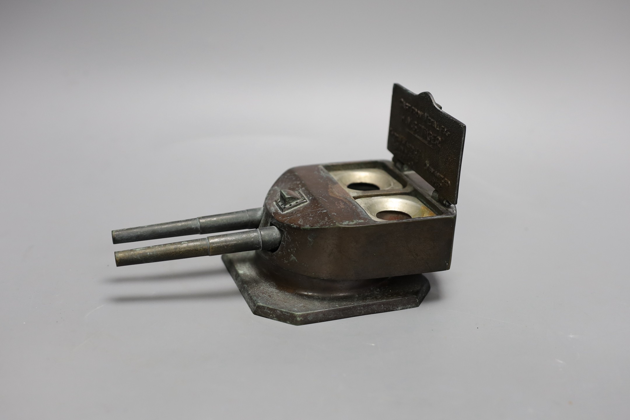 Naval interest- A cast metal ‘gun’ turret, double inkwell, cast from metal ex HMS Tiger, dismantled 1932, 19cm long